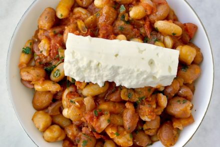 Greek white beans with tomato sauce and feta