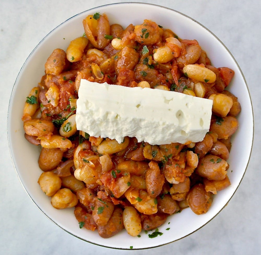 Greek white beans with tomato sauce and feta