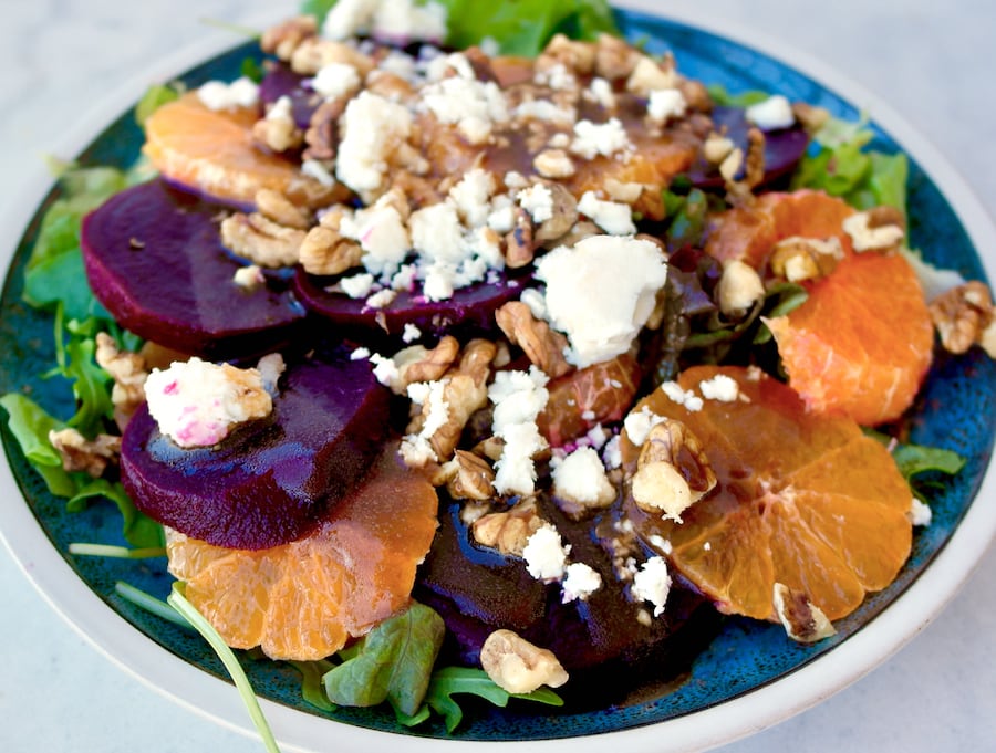 Mediterranean Beet salad with tangerines, greens and feta