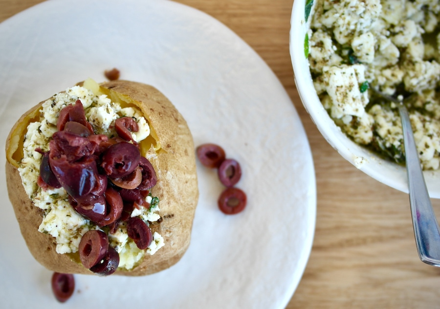 Stuffed baked potatoes with feta and black olives