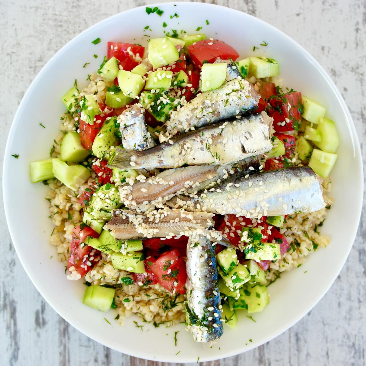 Mediterranean Bulgur Salad with Cucumbers, Tomatoes, Sardines and Fresh