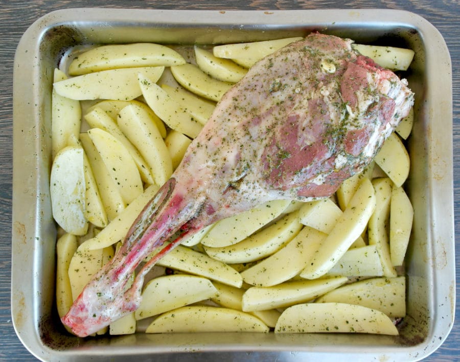 Making Greek Roast lamb and potatoes